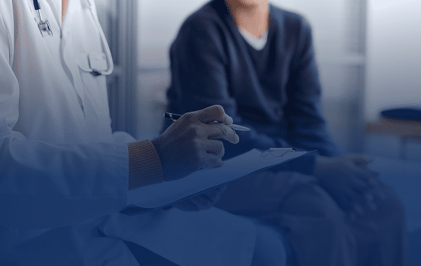 Healthcare provider meeting with patient